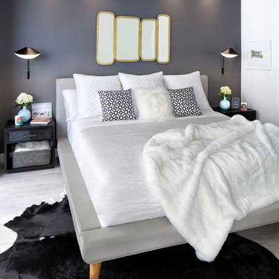 Bedroom - small scandinavian master vinyl floor bedroom idea in Miami with black walls and no fireplace