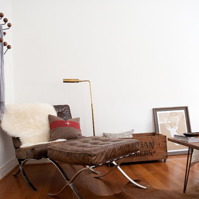Eclectic bedroom photo in Dallas with white walls