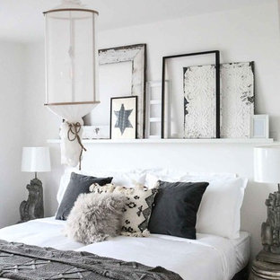 Medium sized romantic bedroom in Surrey with white walls.
