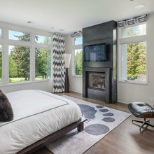 Bedroom With Fireplace and TV