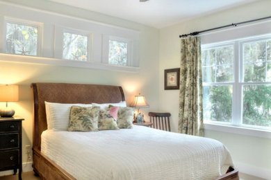 Photo of a medium sized contemporary guest bedroom in Atlanta with beige walls, carpet, no fireplace and beige floors.