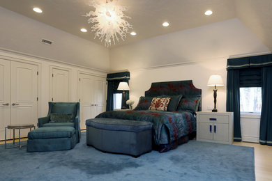Inspiration for a large eclectic master light wood floor bedroom remodel in Atlanta with gray walls and no fireplace