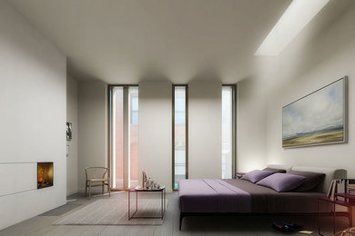 Modelo de dormitorio principal minimalista grande con suelo de madera oscura