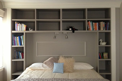 Inspiration for a mid-sized transitional guest bedroom remodel in Boston with gray walls and no fireplace