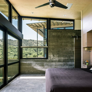 Diseño de dormitorio actual con suelo de cemento