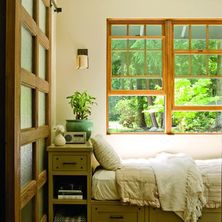 Example of a mid-sized classic guest carpeted and multicolored floor bedroom design in Seattle with beige walls and no fireplace
