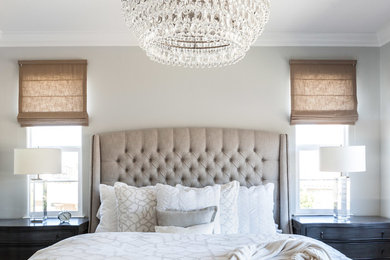 Photo of a traditional master and grey and cream bedroom in Sacramento with grey walls and carpet.