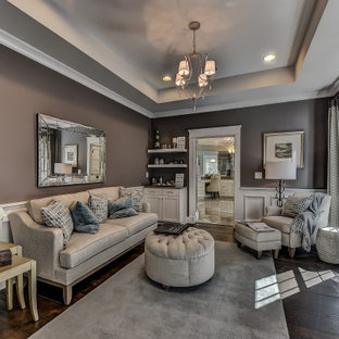 Foto de dormitorio principal, abovedado y boiserie, extra grande, boiserie, con paredes púrpuras, suelo de madera oscura y boiserie