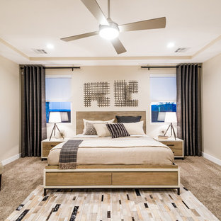 Example of a mid-sized trendy master carpeted bedroom design in Salt Lake City with beige walls and no fireplace