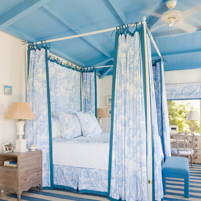 Island style bedroom photo in Boston with white walls