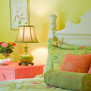 Photo of an eclectic bedroom in Miami with yellow walls.