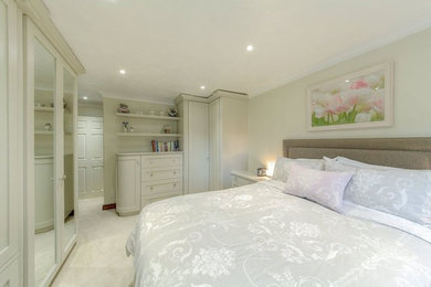 Inspiration for a medium sized classic master bedroom in Other with grey walls, carpet and no fireplace.