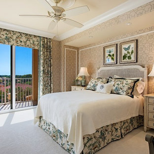 Inspiration for a tropical carpeted and gray floor bedroom remodel in Denver with beige walls