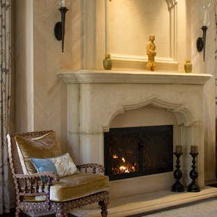 Bedroom - traditional master dark wood floor bedroom idea in Los Angeles with beige walls and a ribbon fireplace