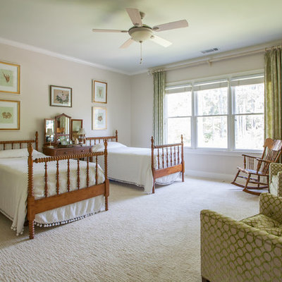 Inspiration for a timeless bedroom remodel in Atlanta with beige walls