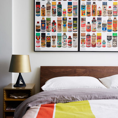 Inspiration for a contemporary bedroom remodel in New York with white walls
