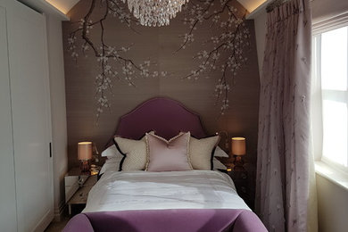This is an example of a contemporary guest bedroom in London.