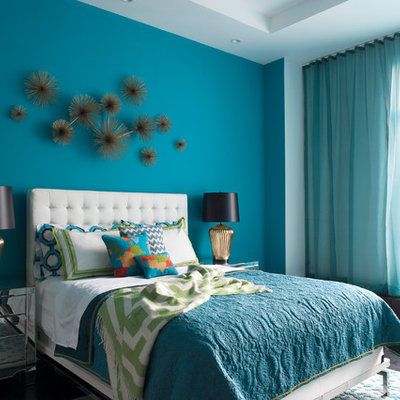 Inspiration for a contemporary bedroom remodel in New York with blue walls