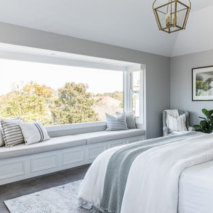 Beach style bedroom in Sydney with grey walls, carpet and grey floor.