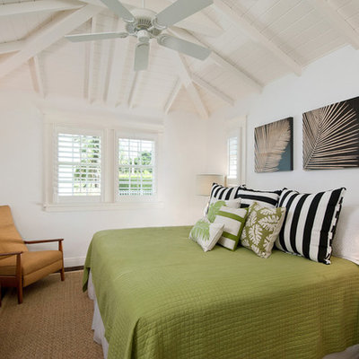 Mid-sized island style master dark wood floor bedroom photo in Miami with white walls and no fireplace