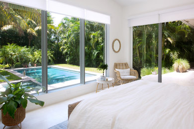 Large transitional master porcelain tile, gray floor and vaulted ceiling bedroom photo in Miami with white walls