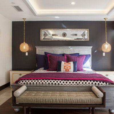 Bedroom - contemporary guest bedroom idea in Miami with gray walls and no fireplace