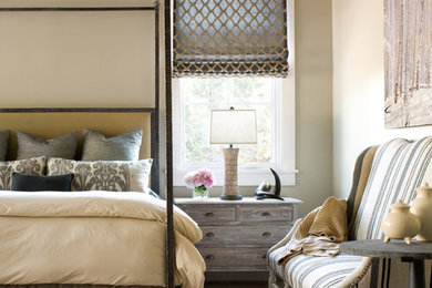 Inspiration for a timeless carpeted bedroom remodel in Denver with beige walls