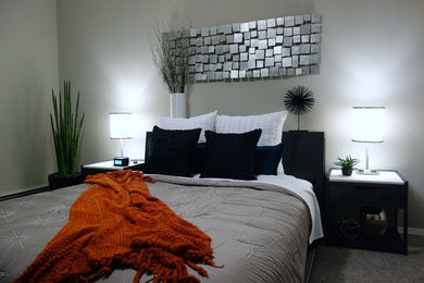 Inspiration for a mid-sized contemporary guest carpeted bedroom remodel in Minneapolis with gray walls and no fireplace