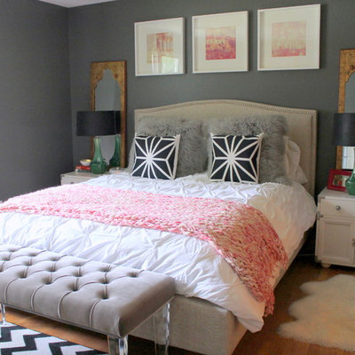 Bedroom - mid-sized eclectic master medium tone wood floor bedroom idea in Kansas City with gray walls