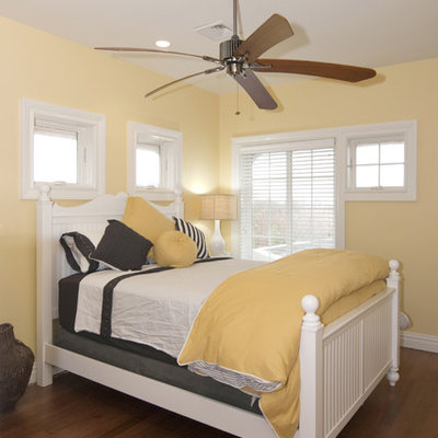 Example of a trendy bedroom design in New York with yellow walls