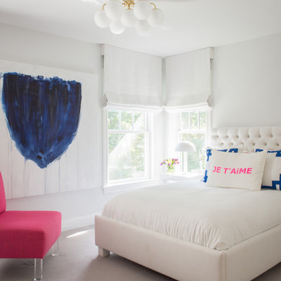 Inspiration for a contemporary bedroom remodel in New York with white walls