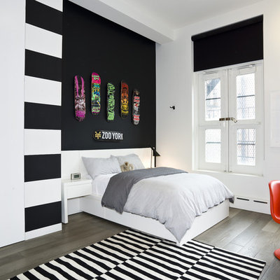 Inspiration for a contemporary dark wood floor bedroom remodel in New York with white walls