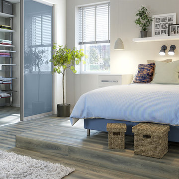 Contemporary Bedroom with Blue Gloss Sliding Doors
