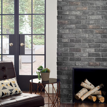 Contemporary Bedroom With Dark Brick Fireplace
