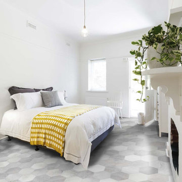 Contemporary bedroom with hexagon porcelain tiled floor