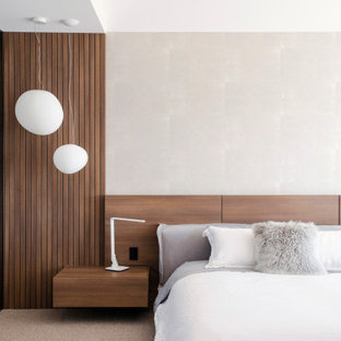 Inspiration for a contemporary bedroom in Brisbane with grey walls and grey floor.