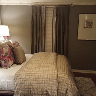 Diseño de dormitorio principal, contemporáneo, con paredes grises y suelo laminado