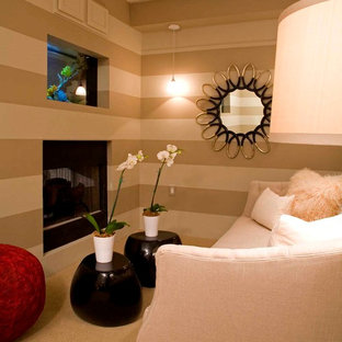 Ejemplo de dormitorio tipo loft, clásico renovado, extra grande, con paredes multicolor y chimenea de doble cara