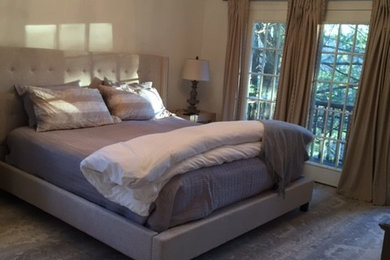 Example of a mid-sized transitional master carpeted and gray floor bedroom design in New York with white walls