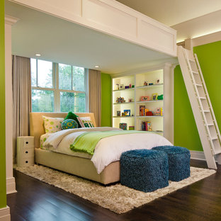 Photo of a large beach style mezzanine bedroom in Chicago with green walls and medium hardwood flooring.