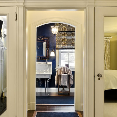 Elegant dark wood floor bedroom photo in New York