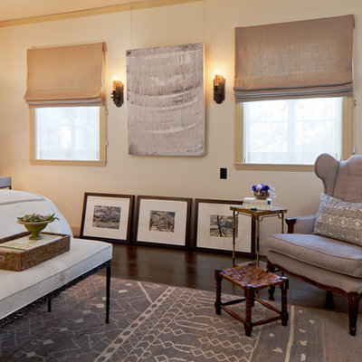 Inspiration for a mediterranean dark wood floor bedroom remodel in San Francisco with beige walls