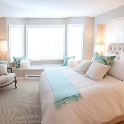 Trendy carpeted bedroom photo in Vancouver with beige walls