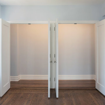 Custom Built-In Closet with Matching Wood Flooring