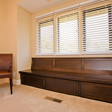 Custom Cabinetry Window Seat with Storage in Guest Bedroom