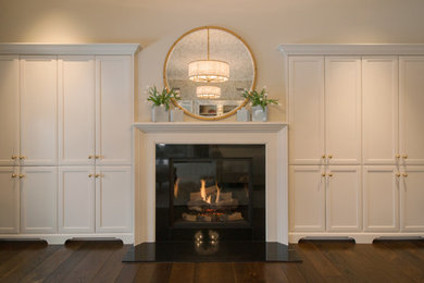 Custom Mantle, Bookshelves, and Wardrobe Cabinetry in Master Suite