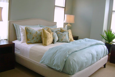 Example of a beach style master carpeted bedroom design in Atlanta with blue walls