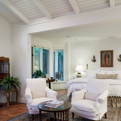 Inspiration for a timeless terra-cotta tile bedroom remodel in Dallas