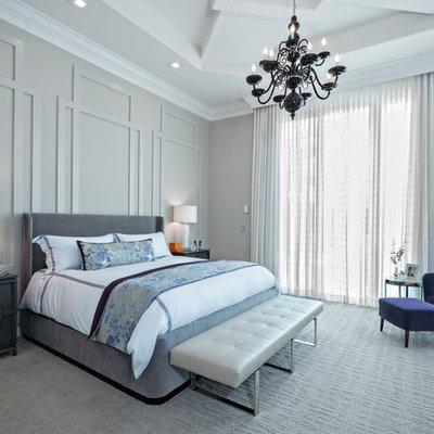 Bedroom - large contemporary master carpeted bedroom idea in New York with gray walls and no fireplace