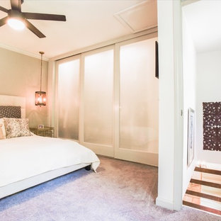 Example of a large transitional master carpeted and brown floor bedroom design in Atlanta with beige walls and no fireplace